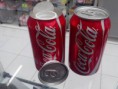 Mocó estilo lata de refrigerante Coca-cola.